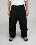BUSI Biggie Cargo Pant Black snowboard and ski cargo pants, front view on model