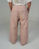 BUSI Biggie Pant Dusty Pink snowboard and ski pants, back view on male model