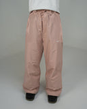 BUSI Biggie Pant Dusty Pink snowboard and ski pants, front view on model