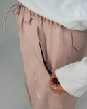 BUSI Biggie Pant Dusty Pink snowboard and ski pants, pocket zip detail