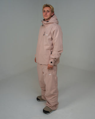 BUSI Core Jacket Dusty Pink snowboard and ski jacket, side view on male model