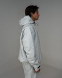 BUSI Core Jacket Light Grey snowboard and ski jacket, side view on model