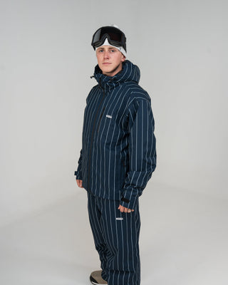 BUSI Core Jacket Pinstripe snowboard and ski jacket, side view with hood up on male model