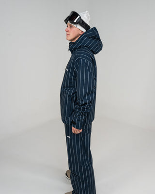 BUSI Core Jacket Pinstripe snowboard and ski jacket, side view on male model