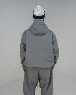BUSI Core Jacket Steel Grey snowboard and ski jacket, back view on model