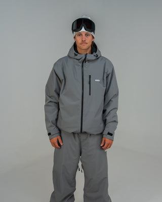 BUSI Core Jacket Steel Grey snowboard and ski jacket, front view on model