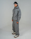 BUSI Core Jacket Steel Grey snowboard and ski jacket, side view on model