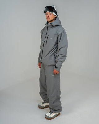 BUSI Core Jacket Steel Grey snowboard and ski jacket, side view on model