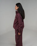 BUSI Core Jacket Wine snowboard and ski jacket, side view on model