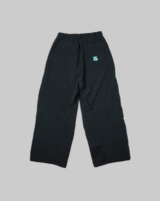 Black pants with a small logo on a white background